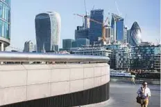  ?? Bloomberg ?? The More London office space in view of 20 Fenchurch Street, also known as the ‘Walkie-Talkie’ and constructi­on in the City of London.