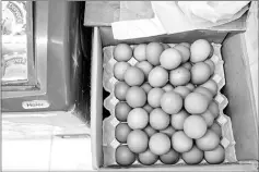  ?? — AFP photo ?? Chicken eggs are seen for sale at a local grocery shop in Hong Kong.