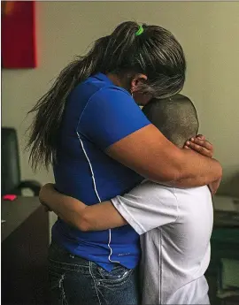  ?? ILANA PANICH-LINSMAN — THE NEW YORK TIMES ?? Patricia and her son, José, 8, from Honduras, in their lawyer’s office in Bryan, Texas. José came to the United States as what the government calls an “unaccompan­ied minor.”