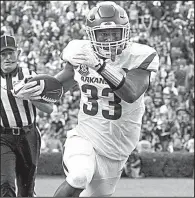  ?? Arkansas Democrat-Gazette/BENJAMIN KRAIN ?? Arkansas’ David Williams, who spent his first three seasons at South Carolina, rushed for 32 yards and 1 touchdown on 7 carries against the Gamecocks on Saturday.