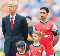  ??  ?? Gunners legend: It’s now Mikel Arteta’s task to follow in the footsteps of Arsene Wenger