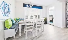  ??  ?? The bright and airy dining area in the Lily show home in Bayview.