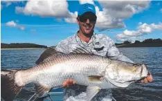  ??  ?? RIPPER: Will Pritchard (Fish Hunter Charters FNQ) with a magic metre-plus Tinaroo barra caught late last week.