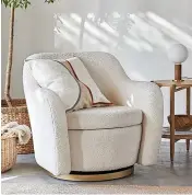  ?? ?? John Lewis snuggle accent swivel chair - gold base, cream boucle, £599, John Lewis
If a boucle cocktail chair – that doubles up as a snug swivel – is on your wish list, this one ticks all the boxes. We love its contempora­ry-cool design and gold base