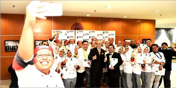  ??  ?? The MSU culinary team in Battle of the Chefs 2018 sharing a proud victory with Professor Tan Sri Dr Mohd Shukri Ab Yajid, MSU President (centre).