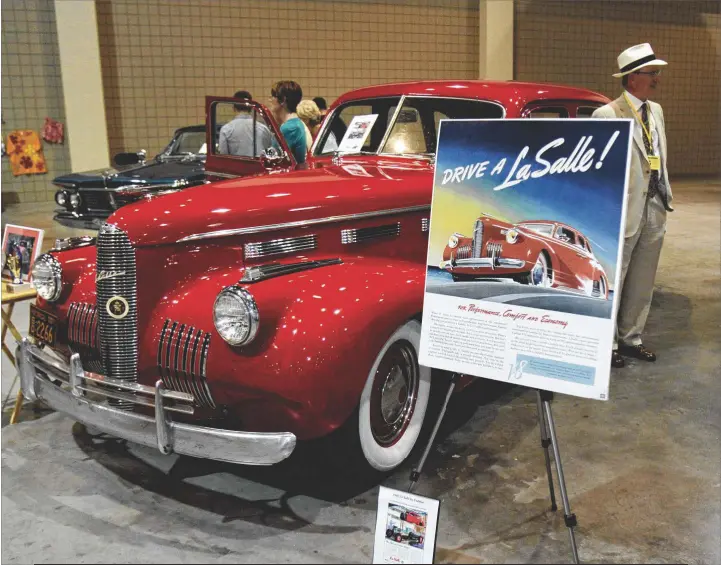  ?? THE NEWS & OBSERVER (RALEIGH, N.C.)
CHRIS SEWARD / ?? Gary Cain from Fuquay-Varina, N.C., poses with his 1940 LaSalle at the Carolina Classics at the Capital car show. The poster shows an ad for the car from the year it was made. Only about 6,500 units of this car were produced. Classic cars are a fun...