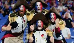  ?? Agence France-presse ?? Fans of the France team cheer prior to the match.