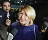  ?? — AFP ?? BRASILIA: Venezuela’s fugitive ex-chief prosecutor, Luisa Ortega, arrives at Brasilia’s Internatio­nal Airport.