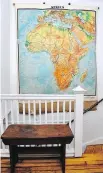  ??  ?? One large wall piece, such as a map, can anchor a room and save money.