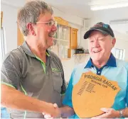  ?? Photos / Supplied ?? Raglan Bowling Club president Bill Bond (right) received the annual shield from Pirongia Bowling Club president Paul Rowland.