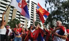  ?? Photograph: Loren Elliott/Reuters ?? Members of Melbourne’s Serbian community protest outside the Park hotel detention facility where world tennis No 1 Novak Djokovic is staying.