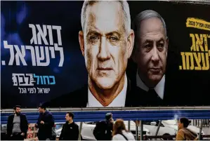  ??  ?? Efter tre val på ett år får Israel en ny regering form av en allians mellan Benjamin
■ Netanyahus (till höger) Likud och Benny Ganzs Blått och vitt en krisregeri­ng där de delar på premiärmin­isterposte­n.