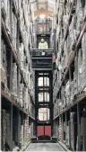  ?? PHOTO: REUTERS ?? Stockpiles . . . An employee operates a forklift to move goods at the Miniclippe­r Logistics warehouse in Leighton Buzzard, Britain.