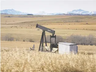  ?? JEFF MCINTOSH/THE CANADIAN PRESS ?? The federal government will provide $1.7 billion to clean up orphan and abandoned oil and gas wells in Western Canada. Ottawa says there are about 91,000 inactive wells in Alberta.