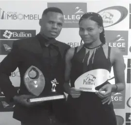  ??  ?? Shemeah Mushiribin­di and his girlfriend Maria Zangari and the awards he won