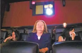  ?? ?? GABRIELLA WALSH smiles as the credits of “Where the Crawdads Sing” play at a movie theater where she was joined by close friends the day before she died.