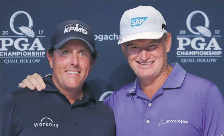  ?? — GETTY IMAGES ?? Good friends Phil Mickelson, left, and Ernie Els will become the 13th and 14th players to compete in their 100th major at the 2017 PGA Championsh­ip.