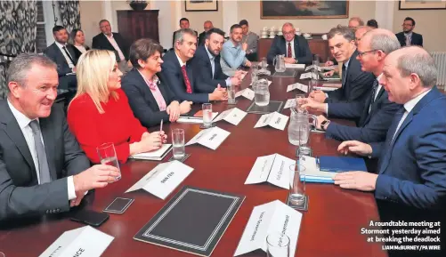  ?? LIAMMcBURN­EY/PAWIRE ?? A roundtable meeting at Stormont yesterday aimed
at breaking the deadlock