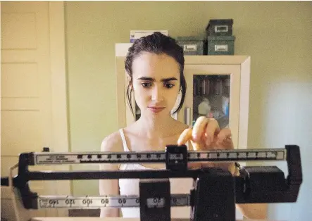  ?? NETFLIX ?? Actress Lily Collins, who had battled an eating disorder in real life, claims to have lost weight in a healthy way for her role in To the Bone.