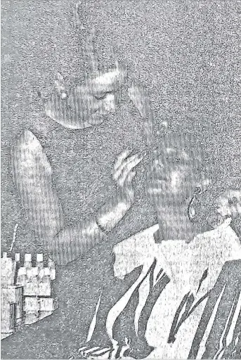  ?? Picture: FILE ?? Veronique Bolse, demonstrat­es the use of Orlane beauty products on a woman in Suva.