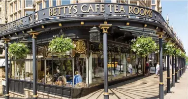  ??  ?? Charming: Bettys Cafe Tea Rooms in Harrogate, which celebrated its centenary last year