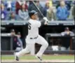  ?? KATHY WILLENS — THE ASSOCIATED PRESS ?? New York Yankees Gleyber Torres watches his walkoff three-run home run during a baseball game against the Cleveland Indians in New York, Sunday.