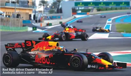  ??  ?? Red Bull driver Daniel Ricciardo of Australia takes a curve Photo: AP