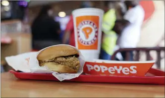  ?? THE ASSOCIATED PRESS ?? A chicken sandwich is displayed at a Popeyes fast food restaurant in Kyle, Texas.