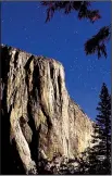  ?? Los Angeles Times/TNS/MARK BOSTER ?? El Capitan strikes a majestic pose while bathed in moonlight. Yosemite National Park in California’s Sierra Nevada mountains is the latest national park to join the YourPassNo­w program.