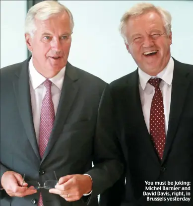  ??  ?? You must be joking: Michel Barnier and David Davis, right, in Brussels yesterday