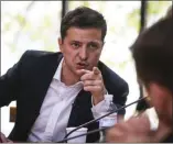  ?? EFREM LUKATSKY ?? Ukrainian President Volodymyr Zelenskiy speaks during talks with journalist­s in Kyiv, Ukraine, Thursday, Oct. 10, 2019. Ukrainian President is holding an all-day “media marathon” in a Kyiv food court amid growing questions about his actions as president.