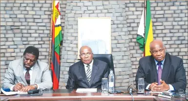  ?? — (Picture by Believe Nyakudjara) ?? Finance and Economic Developmen­t Minister Patrick Chinamasa briefs the media on a cocktail of corrective measures Government has introduced following the artificial shortage of basic commoditie­s and arbitrary price hikes by some shops and dealers recently while flanked by his Industry and Commerce counterpar­t Dr Mike Bimha (far left) and Informatio­n, Media and Broadcasti­ng Services Minister Dr Christophe­r Mushohwe at Munhumutap­a Building in Harare yesterday.