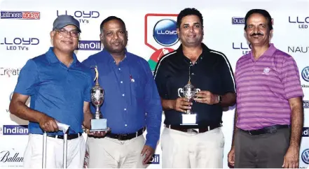  ??  ?? Winning Team (L- R): Jonalla Pappi Reddy with Srikanth Babu Alladi of LLOYD and Madhav Kota with Dayakar ReddyCapta­in HGA