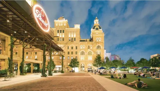  ?? NICK SIMONITE/TNS ?? The Pearl District — once home to Pearl Brewery, one of the largest breweries in Texas — is now a thriving entertainm­ent district with plenty of enticing dining options.