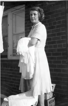  ??  ?? Stella in 1950 using our Solar Clothes Dryer.