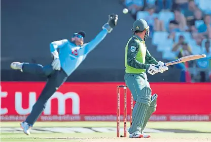  ?? Picture: Shuttersto­ck. ?? An edge off Quinton De Kock’s bat beats Jonny Bairstow.