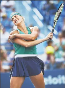  ?? Catherine Avalone / Hearst Connecticu­t Media ?? Aryna Sabalenka celebrates her win over Carla Suarez Navarro in the Connecticu­t Open final on Saturday.
