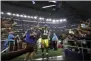  ?? ROGER STEINMAN - THE ASSOCIATED PRESS ?? Green Bay Packers’ Aaron Rodgers acknowledg­es fans as he walks off the field after the team’s NFL football game against the Dallas Cowboys in Arlington,