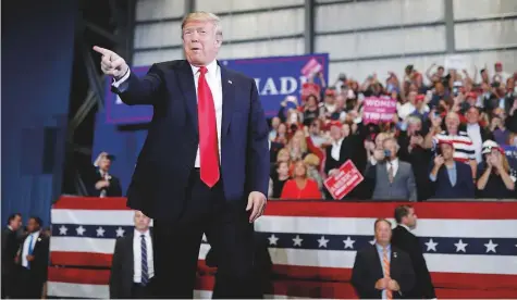  ?? Reuters ?? US President Donald Trump gestures during a campaign rally, ahead of midterm elections, at Pensacola Internatio­nal Airport in Florida. On the campaign trail, Trump has emphasised his desire to “have a great strong powerful border.”