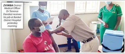  ??  ?? ZVIMBA District Medical Officer Dr Terrence Dandazi receives his jab at Banket District Hospital yesterday morning