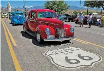  ?? KINGMAN DAILY MINER VIA AP FILE ?? The annual Route 66 Fun Run, featuring vintage autos from all eras, passes through Kingman, Ariz., last year. A new U.S. Senate proposal would designate the Mother Road that connected Chicago to Los Angeles and was once an economic driver for small towns across the post-World War II nation as a National Historic Trail.