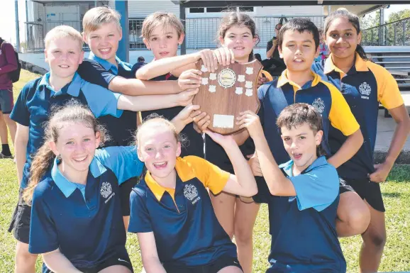  ??  ?? Ingham State School Avenger Taggers celebrate their Senior A title victory after beating Lourdes Aces. Pictures: Cameron Bates