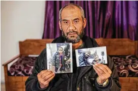  ?? Ons Abid / Associated Press ?? Faouzi Trabelsi is trying to return his grandson, Tamim Jaboudi, pictured in the photos he is holding, to his family in Tunisia. The boy has been trapped in a prison in Libya since his parents left home to join ISIS and were killed.