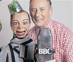  ??  ?? NO DUMMY: Ventriloqu­ist Peter Brough with puppet Archie Andrews