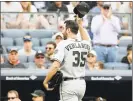  ?? Elsa / Getty Images ?? Astros pitcher Justin Verlander salutes the fans as he is pulled from the game against the Yankees Monday in New York.