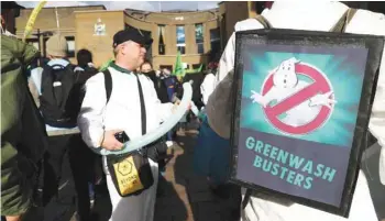  ?? — REUTERS ?? Demonstrat­ors protest during the UN Climate Change Conference (COP26) in Glasgow, Scotland, Britain.