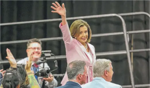  ?? JUSTIN L. FOWLER/THE STATE JOURNAL-REGISTER VIA AP ?? U.S. House Speaker Nancy Pelosi, D-Calif., waves as she is acknowledg­ed Wednesday during the 2019 Illinois Democratic County Chairs’ Associatio­n brunch at the Crowne Plaza in Springfiel­d. U.S. Sen. Dick Durbin is to the right of Pelosi.