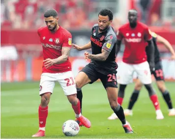  ??  ?? MY BALL:
Stoke City’s Jordan Cousins protects possession in the 1-1 draw at Ashton Gate.