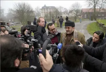  ?? Janerik Henriksson/TT via AP ?? Yemen's minister of agricultur­e and irrigation, Othman Hussein Faid Mujali, right, speaks to journalist­s Friday during the ongoing peace talks on Yemen held at Johannesbe­rg Castle in Rimbo, Sweden.