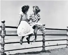  ??  ?? Pat Stewart (right) and below: ‘It’s always windy in Blackpool and my dress kept billowing up’